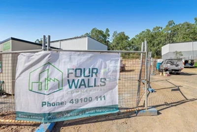 Four Walls Banner on construction site