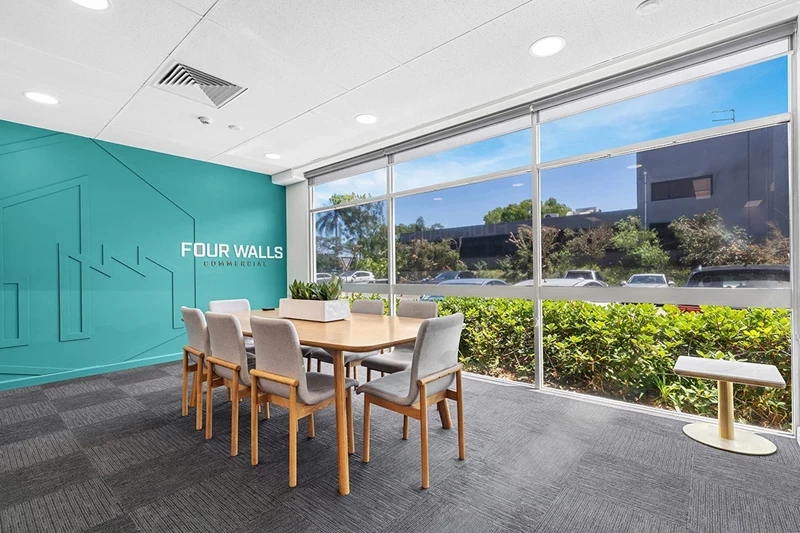 Four Walls Office Interior with table and chairs